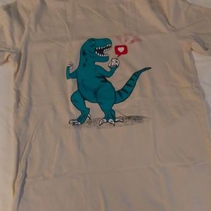An off white T-shirt with a design of a T-rex texting
